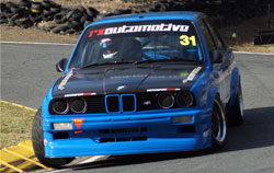 Pierz Harrex driving Blue BMW E30 Track Car